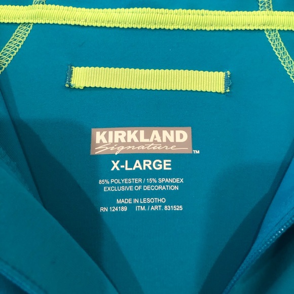 Kirkland Blue long Sleeve Front Zip Top with Hood. 85% Polyester, 15% Spandex. - Picture 4 of 6